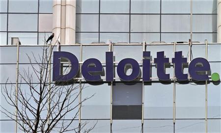 The Deloitte Company logo is seen on a commercial tower at Gurgaon, on the outskirts of New Delhi