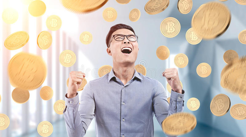 happy-asian-businessman-under-bitcoin-rain-office-portrait-young-wearing-glasses-blue-shirt-standing-96113281