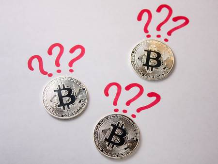 93298389-silver-coins-bitcoin-on-a-white-background-with-a-question-mark