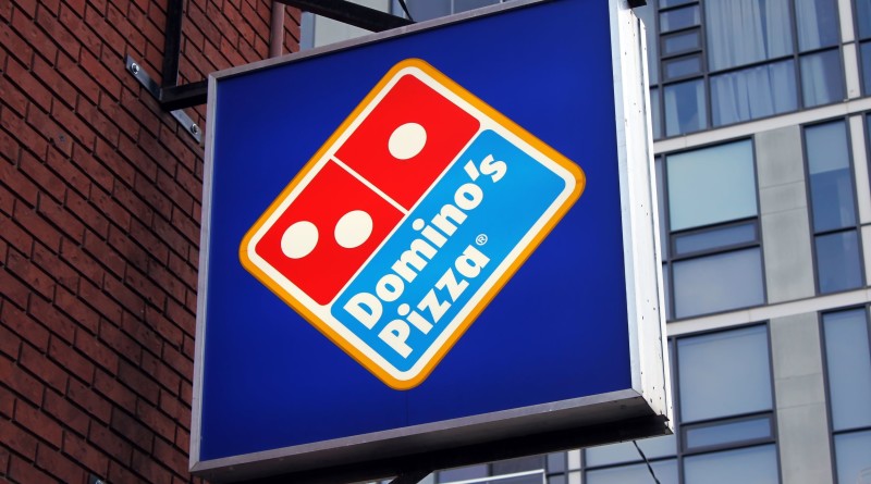 22059430 - dominos pizza restaurant sign